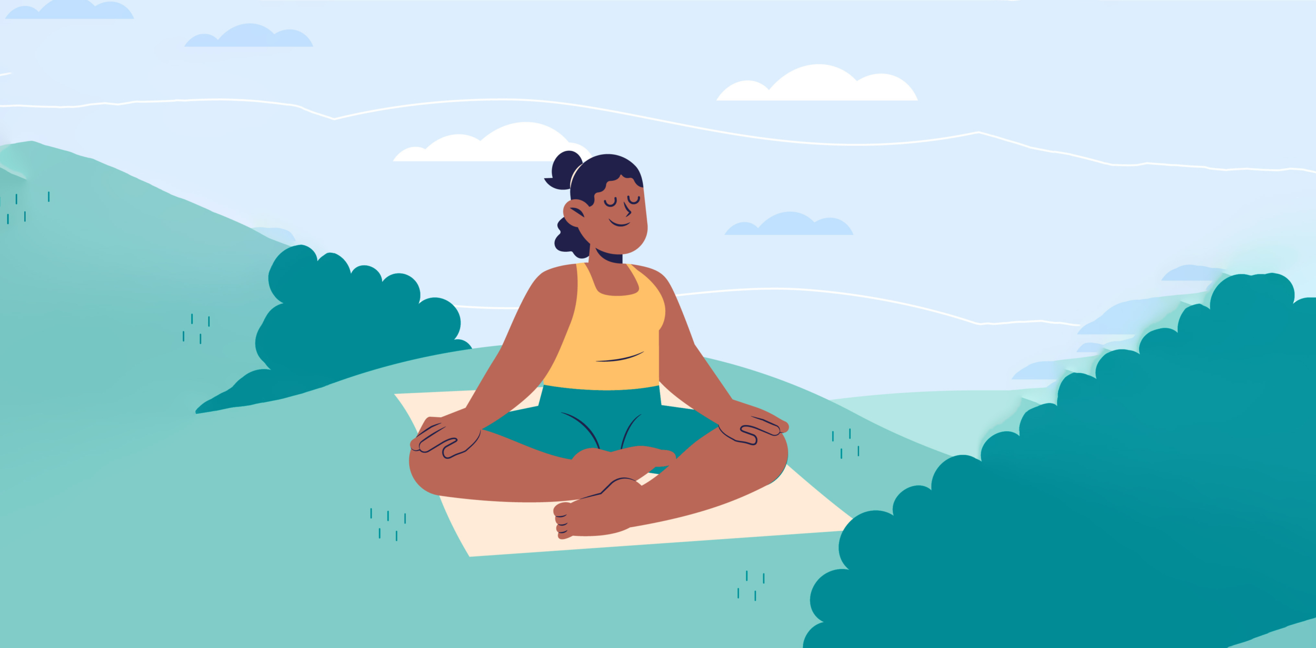 Woman peacefully sitting in an open field